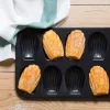 Madeleineform for 12 kaker svart