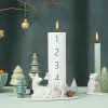 Winter Stories lysestake hjort med kalv
